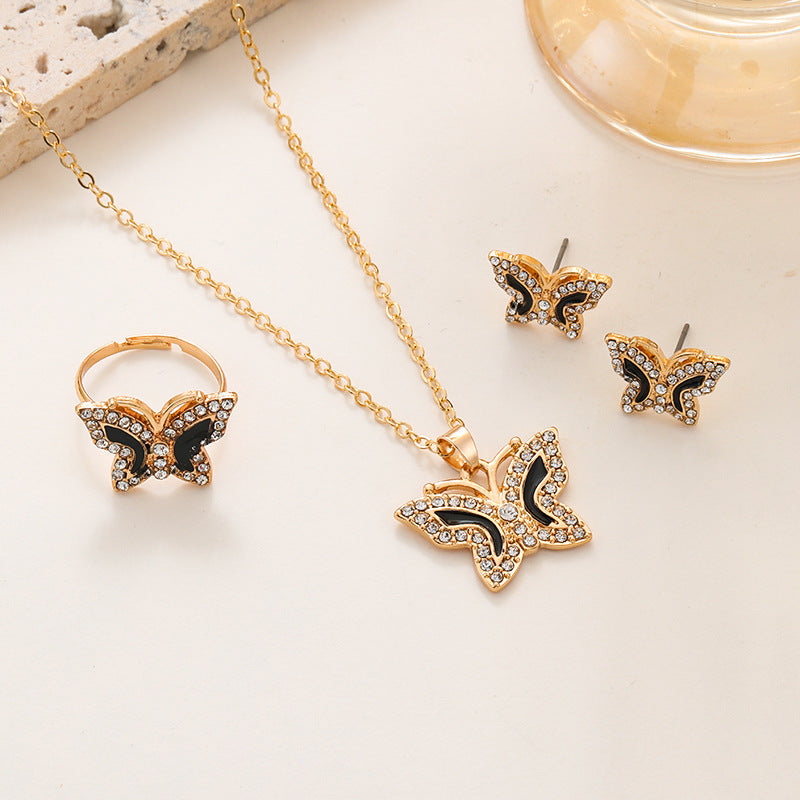 Radiant Butterfly Diamond Jewelry Set – Necklace, Ring & Earrings