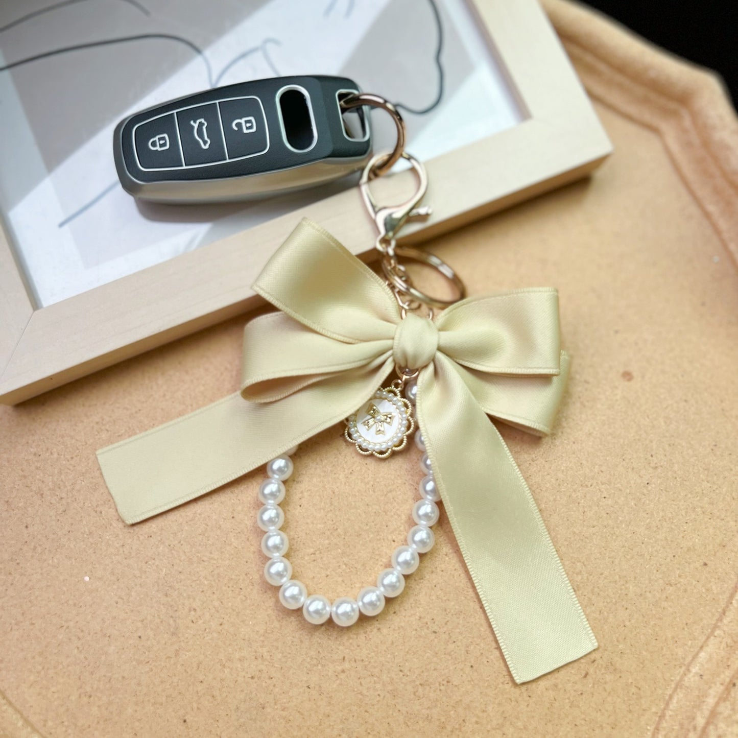 Elegant Bow & Pearl Keychain Charm